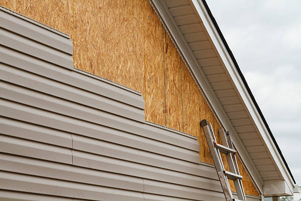 Professional Siding Contractor technician working in Rock Creek, OH